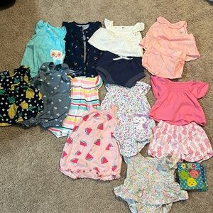 Lot of 11 all size newborn baby girl outfits plus a crunchy book